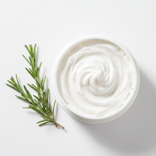 Overhead view of fluffy white rosemary lotion
