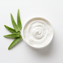 Overhead view of fluffy white standard lotion with aloe